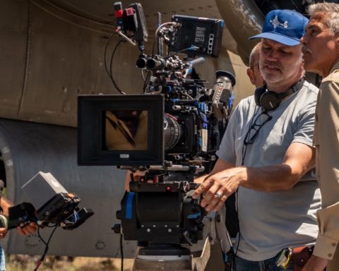 Cinematographer Martin Ruhe and George Clooney on Catch 22 set