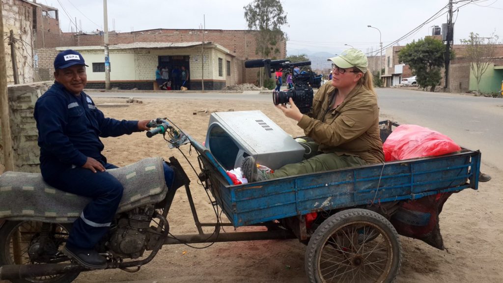 Using the Canon C300’s small profile to get a great shot of our main subject driving his recycling cart.  On location in Lima, Peru for “Agents of Change”.  Photo Credit:  Doug Pray © The One Club