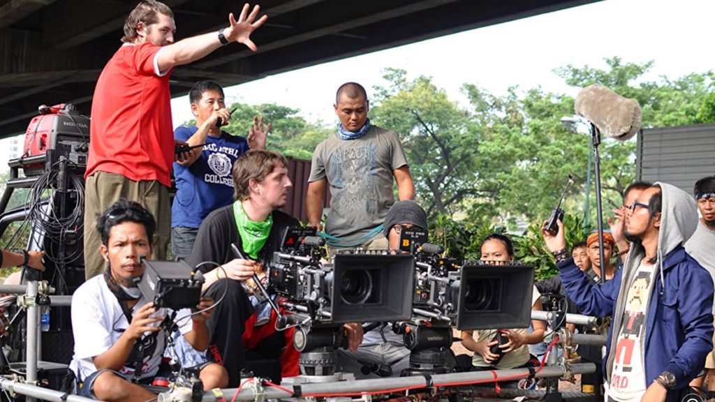 BTS of The Raid 2. Director Gareth Evans with the two cinematographers - Matt Flannery, and Dimas Imam Subhono. Picture: Unknown credit (contact us for the credit). 